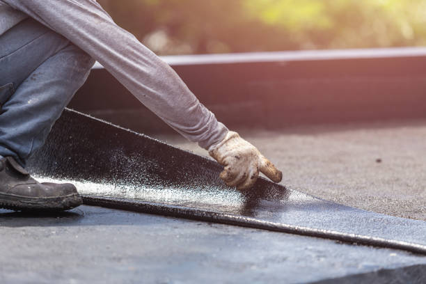 Professional Waterproofing technician working in Midway, KY